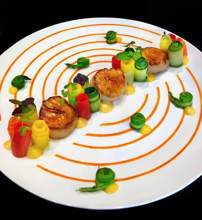 Plated scallop course finished to specification